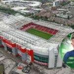 Trafford Pays Tribute to World Darts Champion