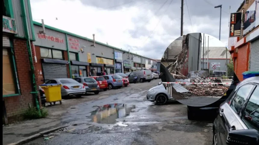 Bury New Road fire destroys the Marc Darcy showroom in Salford as crews tackle hotspots, roads remain closed and police investigate the scene.
