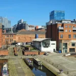 What is the financial reality of living in Manchester UK for individuals and families