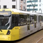 How does the Metrolink tram network connect Manchester to Altrincham