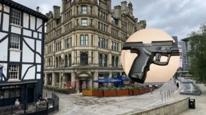 Manchester police seize £70,000 and gun in gang-linked raids